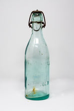 VINTAGE 9 1/2 INCH GREEN GLASS BOTTLE WITH UNUSUAL SWING TOP METAL STOPPER